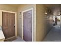 Apartment building hallway with two doors at 12926 Ironstone Way # 201, Parker, CO 80134