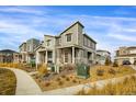 Modern townhome with attractive exterior and landscaping at 24263 E 41St Ave, Aurora, CO 80019