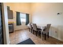 Small dining area adjacent to the kitchen at 974 S Zeno Way, Aurora, CO 80017