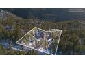 Mountain home with surrounding property on 0.79 acres, located on Ronnie Road at 439 Ronnie Rd, Golden, CO 80403