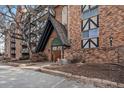 Brick building exterior, showcasing the entrance to Dublin Terrace at 1350 Josephine St # 208, Denver, CO 80206