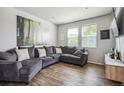 Comfortable living room showcases a plush sectional sofa and modern decor at 16019 E Elk Dr, Denver, CO 80239