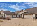 Spacious single story home featuring a large driveway and attached garages, great for multi car families at 23753 E Kettle Pl, Aurora, CO 80016