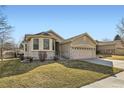 Inviting single-Gathering home with a two-car garage and well-maintained lawn, perfect for suburban living at 10340 Winona Ct, Westminster, CO 80031