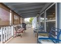 Spacious porch with ample seating, perfect for relaxing outdoors at 8400 Adams Way, Denver, CO 80229