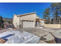Beautiful home with a two-car garage, stucco exterior, and mountain views at 93 Greeley Blvd, Palmer Lake, CO 80133