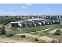 New construction homes in a community with mountain views and open space on a sunny day at 4273 Ridgewalk Pt, Castle Rock, CO 80108
