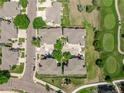 Aerial view of well-maintained neighborhood and lush green golf course at 12912 Grant Cir # A, Thornton, CO 80241