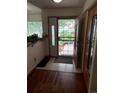 Bright entryway featuring tile flooring and a secure front door for welcoming guests at 14963 E Adriatic Pl, Aurora, CO 80014