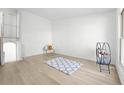 Spacious living room with hardwood floors and neutral paint, offering a bright, inviting space at 5112 Duluth Ct, Denver, CO 80239