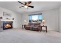 Spacious living room with fireplace and comfortable seating at 77 N Irvington St, Aurora, CO 80018