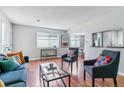 Inviting living room with stylish furnishings, hardwood floors, and plenty of natural light at 6650 E Arizona Ave # 154, Denver, CO 80224