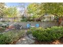 Back yard featuring a patio, mature trees, and professional landscaping at 3242 4Th St, Boulder, CO 80304