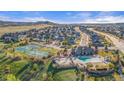 A Primary planned community featuring tennis courts, pool, clubhouse and mountain views at 5900 Haywagon Ln, Castle Rock, CO 80108