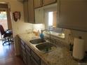 Kitchen view looking into the living room at 8781 N Pierce Way # 102, Arvada, CO 80003