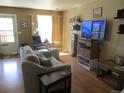 Comfortable living room with lots of natural light at 8781 N Pierce Way # 102, Arvada, CO 80003