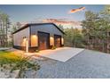 Modern detached garage with two bays and ample parking space at 5090 S Perry Park, Sedalia, CO 80135
