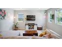 Cozy living room with natural light, stylish furniture, and decorative accents at 4080 Adams St, Denver, CO 80216