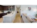 Bright open-concept space with modern kitchen and comfortable living area, great for entertaining at 4080 Adams St, Denver, CO 80216