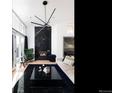 Living room showcasing a marble fireplace and comfortable seating at 2055 Eliot St, Denver, CO 80211