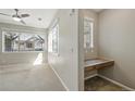 Bright room featuring dedicated office nook with built in desk by the window at 31112 Black Eagle Dr # 103, Evergreen, CO 80439