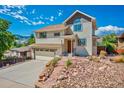 Beautiful front exterior of this two-story home showcasing its architectural design at 420 Sunshine Pkwy, Golden, CO 80403