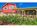 Welcoming front porch with decorative details and curb appeal at 15373 Uravan St, Brighton, CO 80601