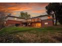 Expansive backyard with a multi-level deck, ideal for outdoor activities and entertaining guests at 4095 Field Dr, Wheat Ridge, CO 80033