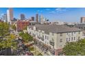 Beautiful Denver building with city views, showcasing a rooftop perspective of modern urban living at 837 E 17Th Avenue # 2K, Denver, CO 80218