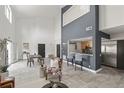 Bright, open living space with high ceilings, modern kitchen, and stylish furniture at 837 E 17Th Avenue # 2K, Denver, CO 80218