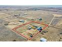 Aerial view of the property showing the boundary, horse facilities, and surrounding land at 7686 County Road 21, Fort Lupton, CO 80621