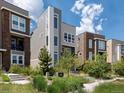 Modern home showcasing unique architectural design and well-maintained landscaping at 3654 Penang Dr, Castle Rock, CO 80109