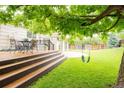 Beautiful backyard with a deck and a lush lawn, perfect for outdoor entertaining and Gathering activities at 7328 S Kit Carson St, Centennial, CO 80122