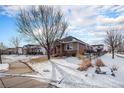 House exterior showcasing landscaping and a walkway at 6321 Spring Gulch St, Frederick, CO 80516