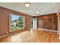 Inviting living room with hardwood floors and lots of natural light at 380 E 111Th Pl, Northglenn, CO 80233