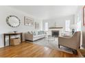 Light-filled living room features hardwood floors, fireplace, and stylish furnishings at 1220 Magnolia St, Denver, CO 80220