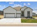 Charming home featuring a three-car garage, well-maintained lawn, and welcoming curb appeal at 13805 Emerald Lake St, Parker, CO 80138