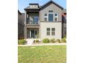Beautiful two story home with a porch, balcony, stone accents, a well manicured lawn and beautiful landscaping at 1925 W 165Th Way, Broomfield, CO 80023