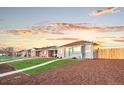 Charming single-story home with landscaped front yard, inviting walkway, and cozy exterior paint at 3630 Magnolia St, Denver, CO 80207