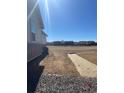 Newly graded backyard, showing initial preparations for seeding and landscaping at 16622 E 109Th Ave, Commerce City, CO 80022