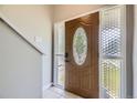 Elegant front door with decorative glass and sidelights, creating a grand entrance at 1477 S Wright St, Lakewood, CO 80228