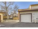 View of a spacious garage with an attached storage area at 1945 W 102Nd Ave, Thornton, CO 80260