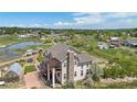 An expansive view of the home's backyard, pergola, and surrounding countryside at 7587 Wright Ct, Arvada, CO 80005