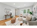 Inviting living room with hardwood floors, neutral decor, and a comfortable seating area at 635 Fillmore St, Denver, CO 80206
