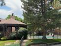 Charming gazebo and pool area offers a serene setting for relaxation and outdoor enjoyment at 9411 W 89Th Cir, Westminster, CO 80021