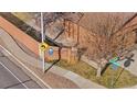 An aerial view of the community sign for Stanley Lake Condominiums at 9411 W 89Th Cir, Westminster, CO 80021
