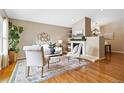 Bright living room with hardwood floors and fireplace at 25 Canongate Ln, Highlands Ranch, CO 80130