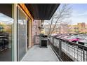 Private patio with space for grilling and relaxing, perfect for outdoor enjoyment at 9019 E Panorama Cir # D211, Centennial, CO 80112