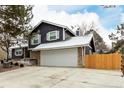 Charming two-story home with a stone facade and a two-car garage at 2014 S Pagosa St, Aurora, CO 80013