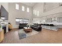 Spacious living room with high ceilings and open floor plan at 7125 S Yantley Way, Aurora, CO 80016